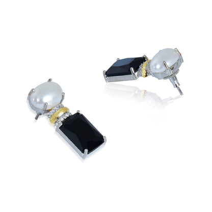 Statement half pearl and black cut stud earrings